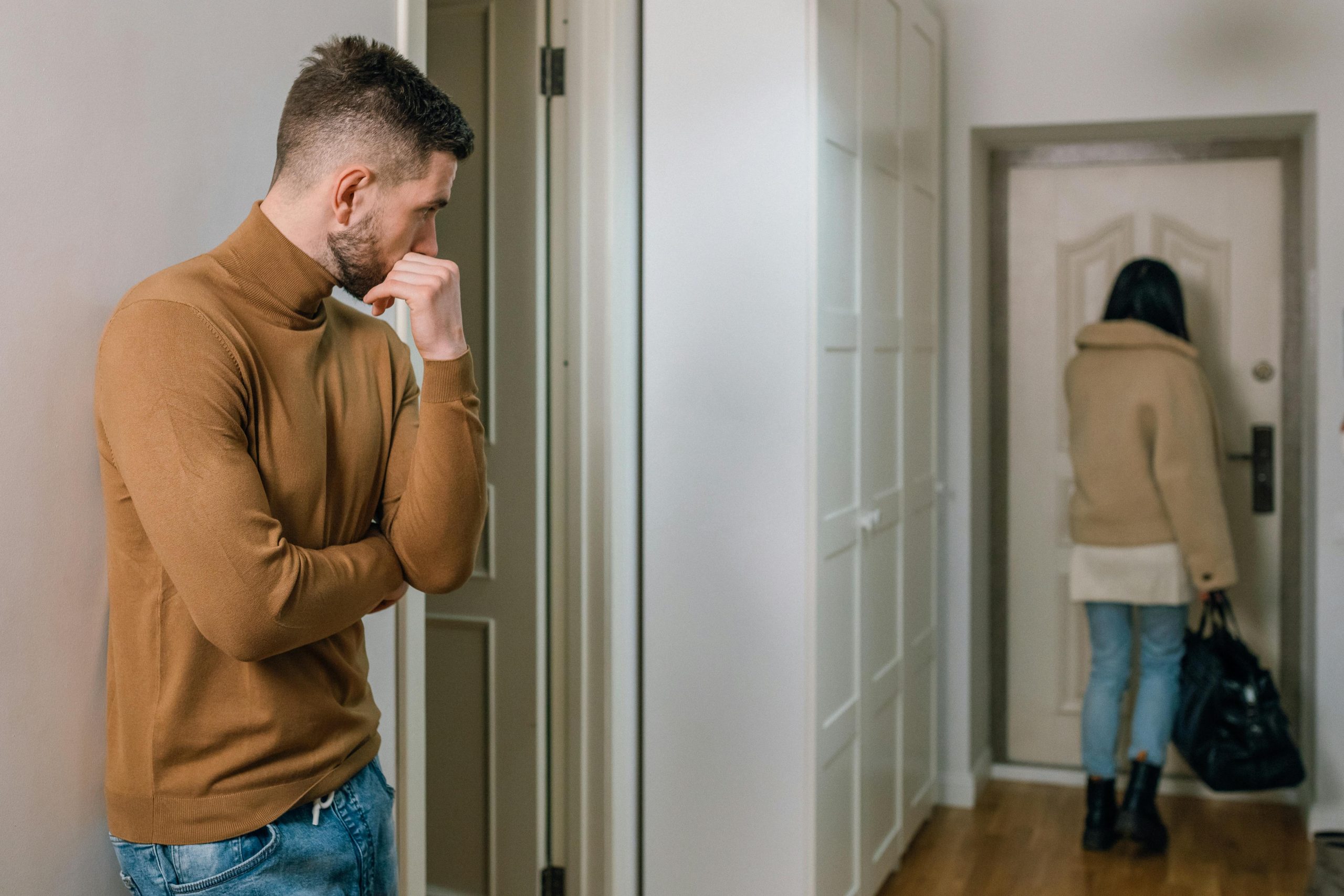 Man feeling regret after infidelity in a romantic relationship, seeking counselling support